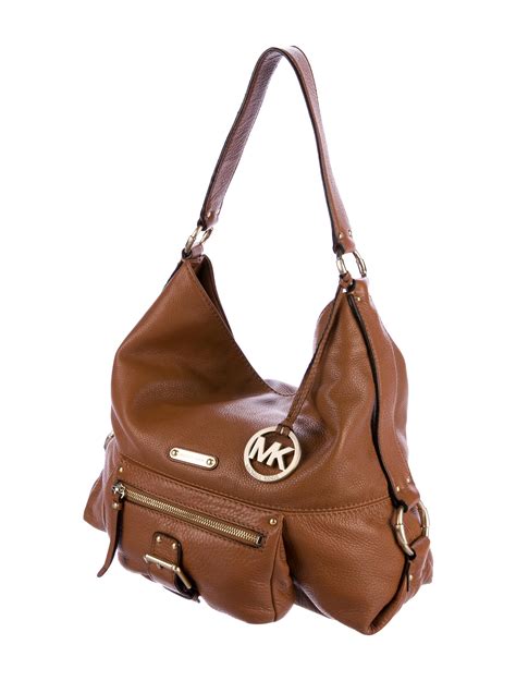 are all michael kors bags real leather|genuine leather michael kors purses.